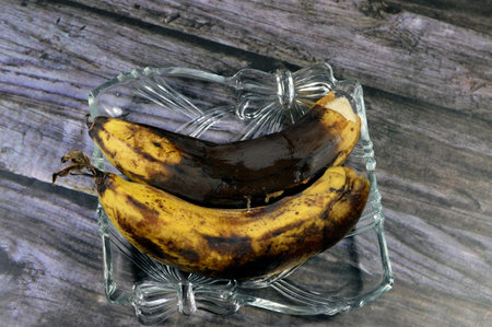 Banana with mold, mould is one of the structures that certain fungi can form, formation of spores containing fungal secondary metabolites, decaying lemon, dry, discolored, disambiguationの写真素材