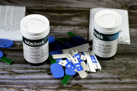 Cairo, Egypt, January 10 2024: Rotacheck blood glucose electronic test strip for a glucose monitoring device to follow up diabetic patients, adjust drug doses and medications, code electronic chipのeditorial素材