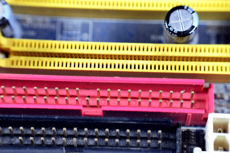 A closeup of a computer main board electronic motherboard, the main printed circuit board (PCB) in...