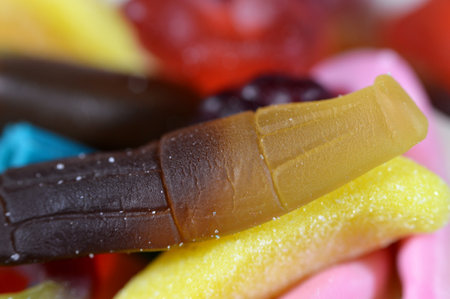 Gummy candy, Gummies, gummi candies, gummy candies, or jelly sweets,  gelatin-based chewable sweets. Gummy sour jelly sweets candies in various shapes, a popular confectionery for childrenの写真素材