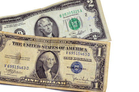 vintage retro old American money of one American dollar series 1935 banknote with George Washington, 2 dollars 1976 Thomas Jefferson, background of Old United States Of America money dollars notesの写真素材