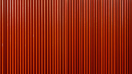 Red corrugated metal sheet useful as a background - vertical linesの素材