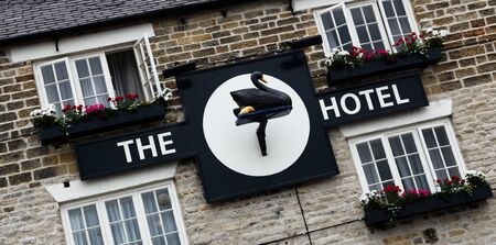 Helmsley, North Yorkshire, Engalnd, June 24, 2010: The unique sign on the front of the historic Black Swan Hotel.のeditorial素材