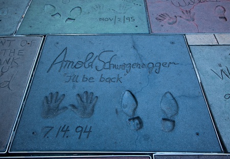 Hollywood, CA - January 19: Arnold Schwarzenegger's hand and foot prints in the sidewalk infront of...