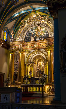 LIMA / PERU - May 10 2016: The interior of a beautifully decorated Catholic Church with elaborate paintings and gold leafing in Lima, Peru.のeditorial素材