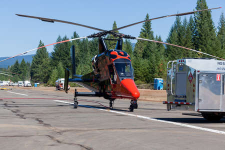Prospect,  Oregon / USA - September 9, 2014:  The special built K-MAX helicopter with intermeshing rotors being prepared to help put out the 790 Fire near Prospect, Oregon.のeditorial素材