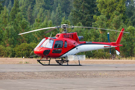 Prospect,  Oregon / USA - September 13, 2014:  A small rescue helicopter is on standby at the Prospect State Airport in support of the 790 Fire crew near Prospect, Oregon.のeditorial素材