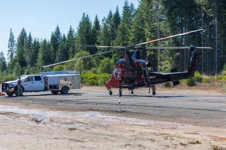 Prospect,  Oregon / USA - September 9, 2014:  The special built K-MAX helicopter with intermeshing rotors being prepared to help put out the 790 Fire near Prospect, Oregon.のeditorial素材