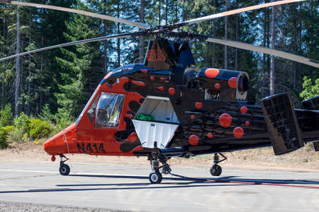 Prospect,  Oregon / USA - September 9, 2014:  The special built K-MAX helicopter with intermeshing rotors being prepared to help put out the 790 Fire near Prospect, Oregon.のeditorial素材
