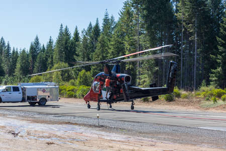 Prospect,  Oregon / USA - September 9, 2014:  The special built K-MAX helicopter with intermeshing rotors being prepared to help put out the 790 Fire near Prospect, Oregon.のeditorial素材