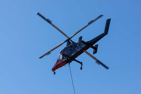 Prospect,  Oregon / USA - September 9, 2014:  The special built K-MAX helicopter with intermeshing rotors taking off to go fight the 790 Fire near Prospect, Oregon.のeditorial素材