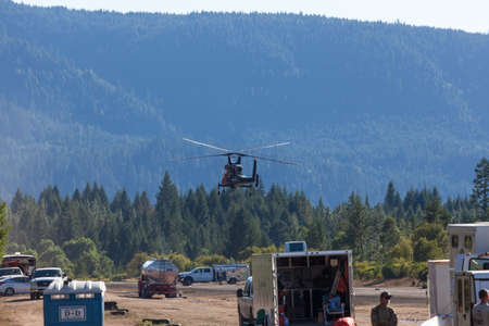 Prospect,  Oregon / USA - September 9, 2014:  The special built K-MAX helicopter with intermeshing rotors taking flight to go help put out the 790 Fire near Prospect, Oregon.のeditorial素材
