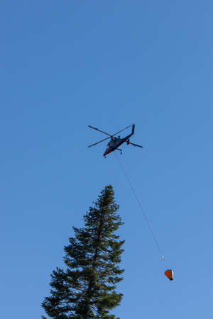 Prospect,  Oregon / USA - September 9, 2014:  The special built K-MAX helicopter with intermeshing rotors taking off to go fight the 790 Fire near Prospect, Oregon.のeditorial素材