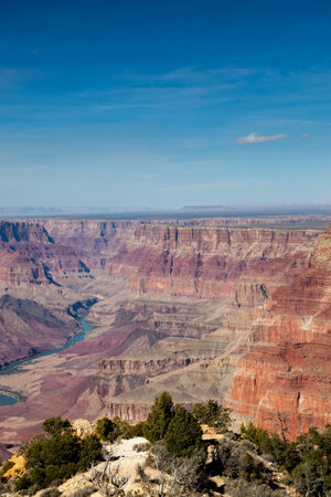 Looking from the Desert View Watchtower into the colorful landscape of the Grand Canyon and the Colorado River in Northern Arizona on a clear day.の写真素材