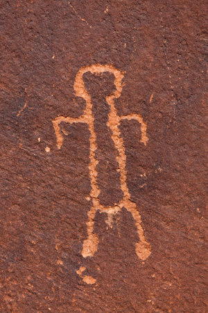 Ancient petroglyphs carved into the sandstone walls of Glen Canyon along the Colorado River near Page, Arizona.の写真素材