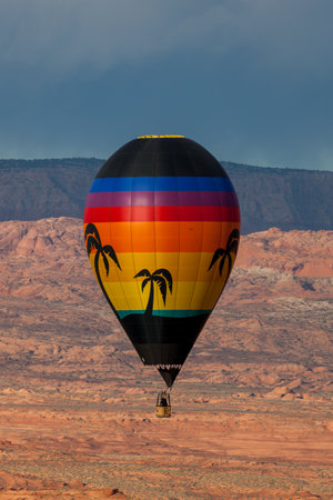 Page, Arizona / USA - October 31, 2014:  A participant in the Lake Powell Balloon Regatta floats over scenic landscape at the annual festival in Page, Arizona.のeditorial素材