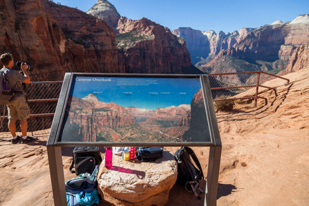 Zion National Park, Utah / USA - November 7, 2014:  A metal sign with a picture that identifies the surrounding mountains at Canyon Overlook Trail in Zion National Park.のeditorial素材