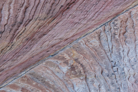 Layers of ancient sandstone rock in pastel colors in Zion National Park, Utah. Background.の写真素材