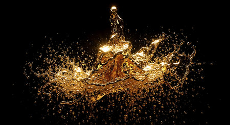 Golden liquid splash on black backdrop perfect for creating luxury abstract artwork promoting premium drinks and jewelry.の素材