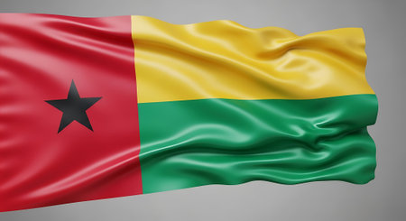 Guinea-Bissau flag waving. It symbolizes patriotism and national identity. Represents sovereign nation. Background image.の素材