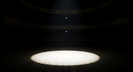 Illuminated theater stage for show presentation. Wooden surface floor with spotlight. Spotlight illuminating dark background. Presentation and scene.の素材