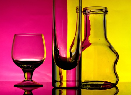 Glass goblets on a colored background abstractの写真素材