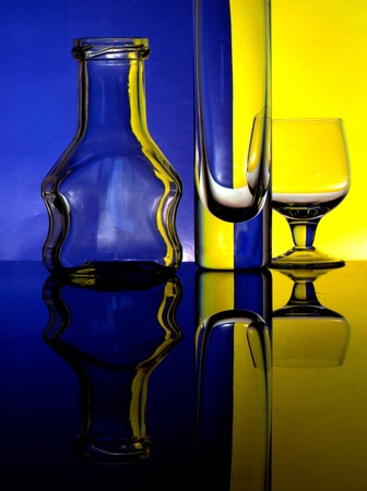 Glass goblets on a colored background abstractの写真素材