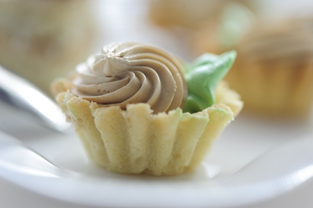 Shortbread cake with butter cream with a blurred background