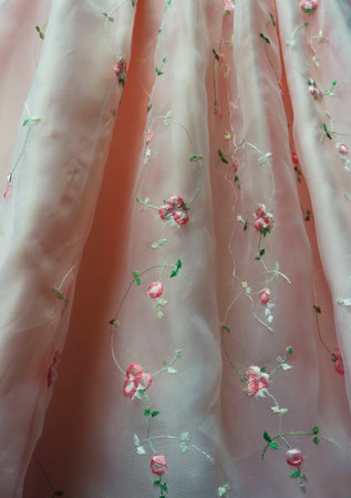 Pink Sheer Fabric with Embroidered Flowersの写真素材