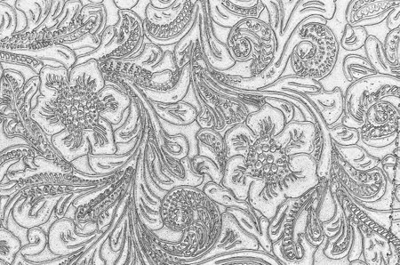 Embossed Leather with a Black and White Floral Patternの写真素材