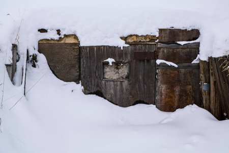 Old cellar buried in the snow.の写真素材