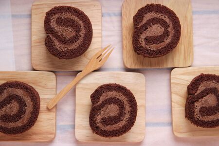 Chocolate place on wooden tray in basket,topview.Made from natural ingredients.の写真素材