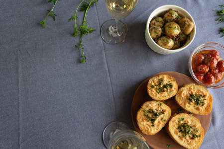 Wine and tapas and Meitai French flat lei