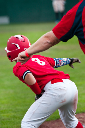 Youth baseball player getting ready to steal.の写真素材