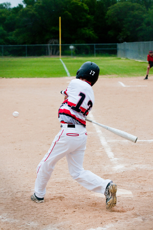 American youth baseball player batting.の写真素材