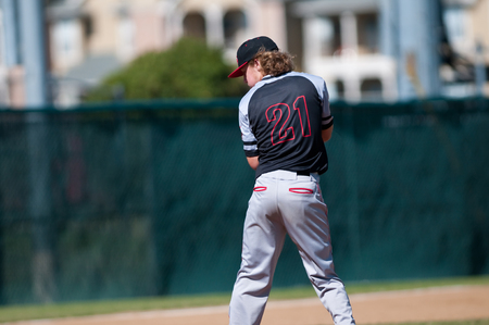 High school pitcher on the mound.の写真素材