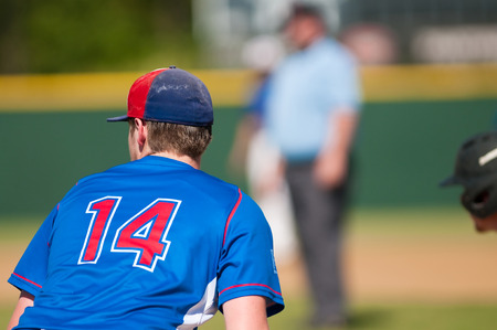 High school baseball player from behind.の写真素材