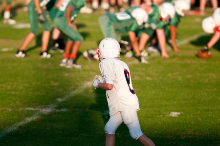 Wide Reciever waiting to go out for a pass.の写真素材