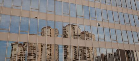 anstract of buildings in the glass of another building. Reflections