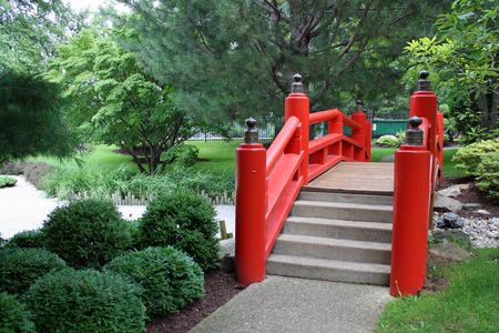 Red Bridge in a Japanese Gardenの写真素材
