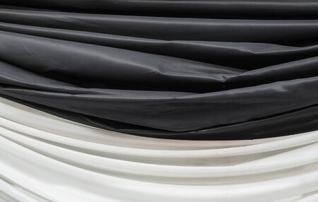Closeup to Black and White Fabric in Funeral Ceremony Background