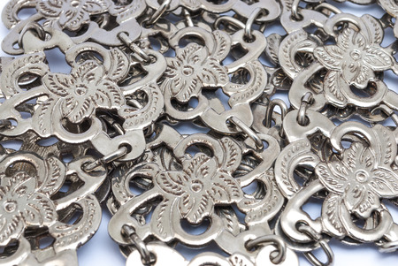 Closeup to Pile of Thai Flower Silver Belt Backgroundの写真素材