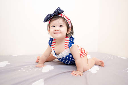 Asian Thai Cute Baby Girl in American Flag Costume, Independence Day.の写真素材