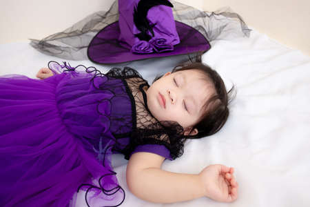 Asian Thai Cute Baby Girl in Witch Costume, Halloween Dayの写真素材