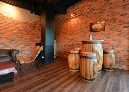 Retro sofas in living room with decoration in apartment, loft style, interior designのeditorial素材