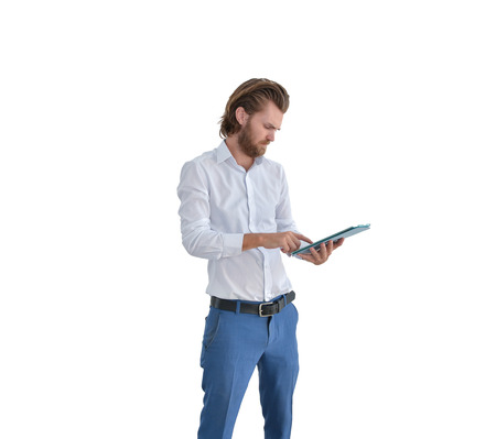 Stressed western businessman using a tablet isolated on whiteの写真素材