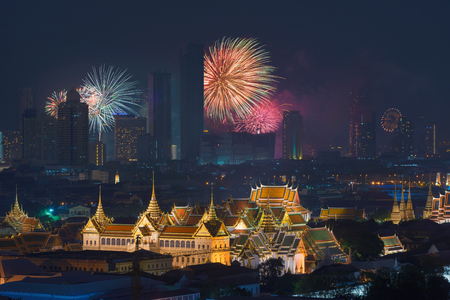 Fireworks glowing behind Grand Palace in Bangkok City, Thailandの写真素材
