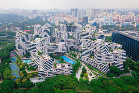 The Interlace apartments in Singapore city and skyscrapers buildings. Modern architecture background. Aerial viewの写真素材