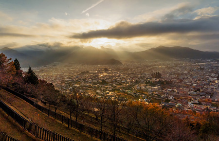 Aerial view of Fujikawaguchiko, Yamanashi at sunset. Urban city, Japan. Landscape with architecture buildings with sunlightの写真素材