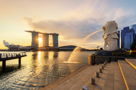 Merlion and Marina Bay Sands with skyscraper buildings in Singapore Downtown and Financial district at sunriseのeditorial素材